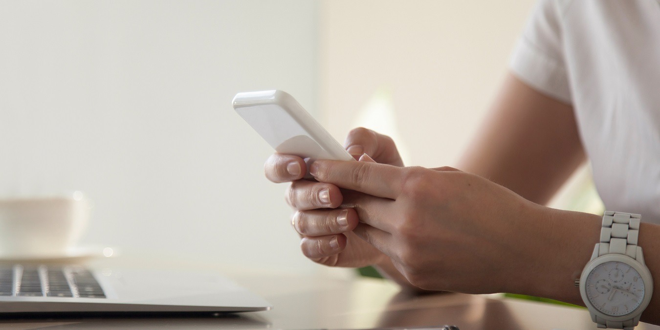 Businesswoman Looking Important Contact On Phone